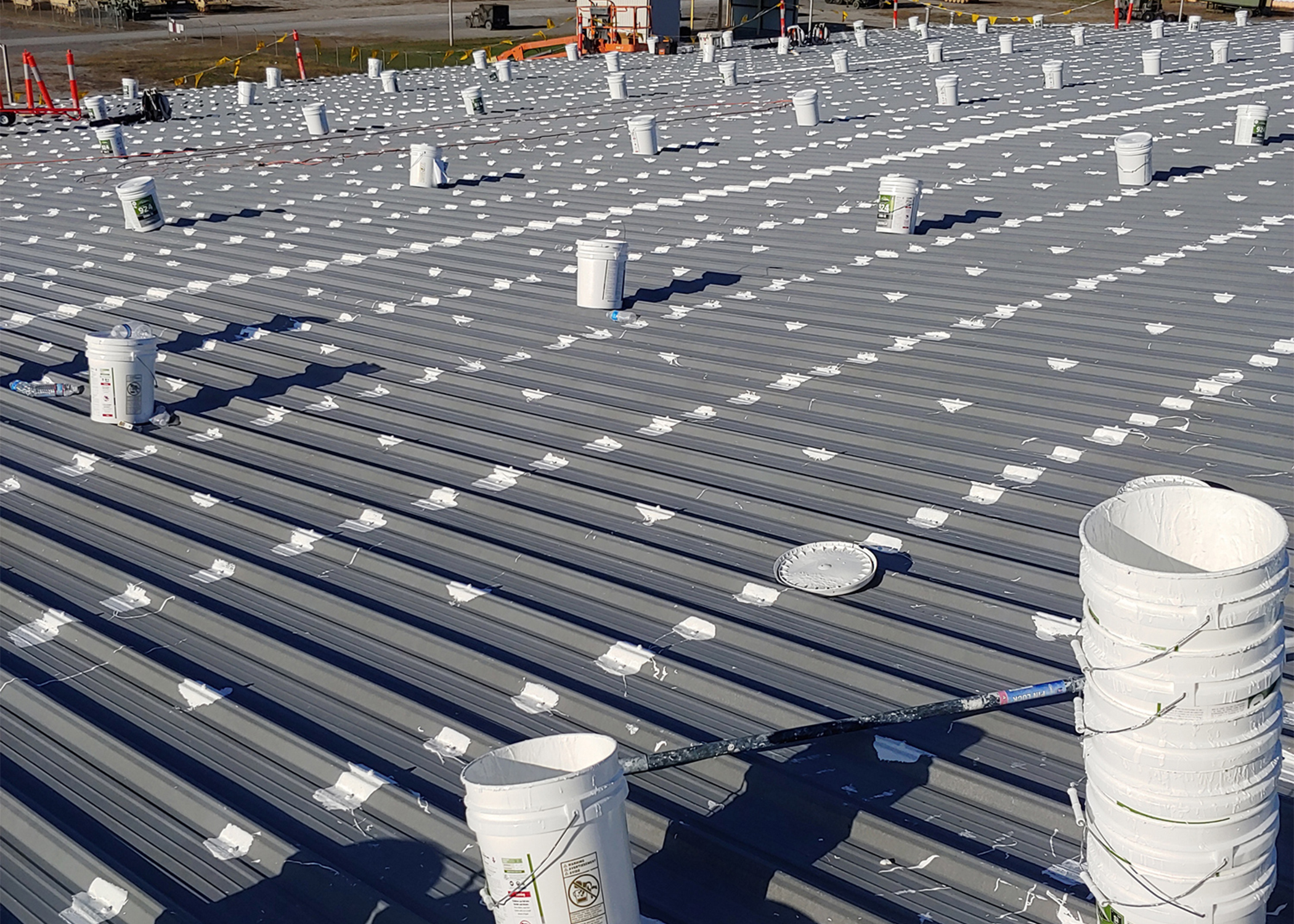 Silicone Roof Coating — Fluid-Applied Restoration